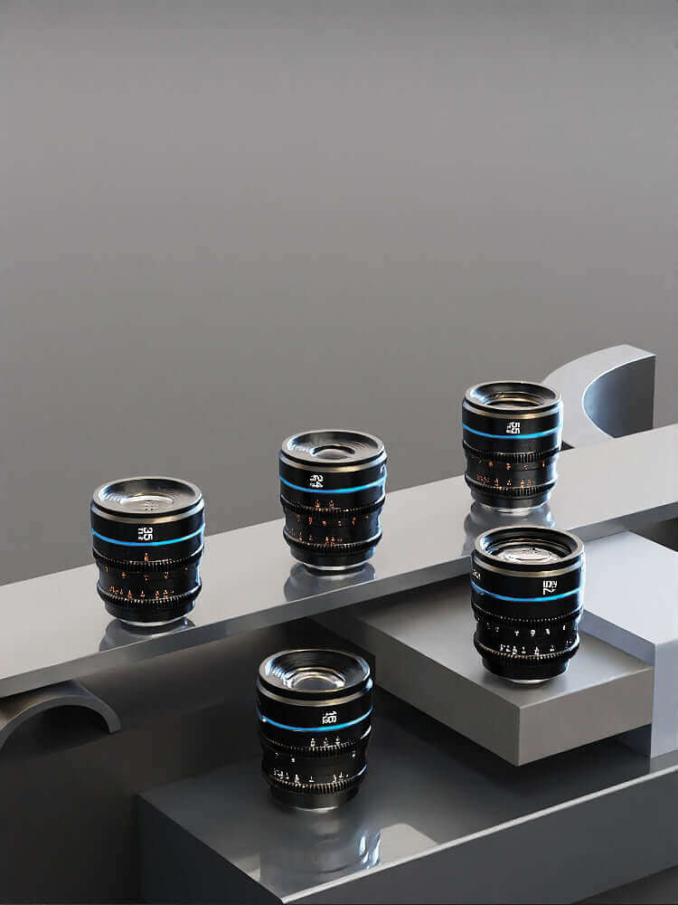 Collection of five premium camera lenses displayed elegantly on a sleek surface.