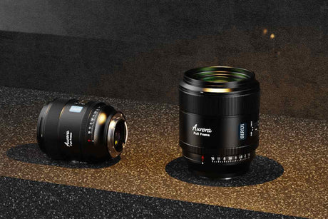 What Camera Give You Ultra Clear Quality Vlogging for YouTube (2026) - Aurora camera lenses on a reflective surface.