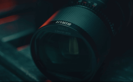 Close-up of a Sirui camera lens showcasing its design and clarity.