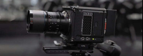 RED camera equipped with anamorphic lens, showcasing cutting-edge filmmaking technology in a studio setting.