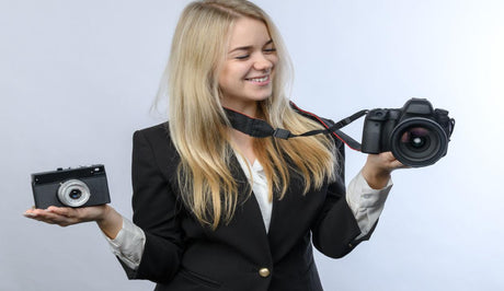 Hunting Best Video Camera for Filmmaking on a Budget (2026) - Woman comparing different cameras.