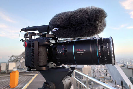 Camera setup with a microphone on a rooftop, ideal for capturing high-quality video and sound.