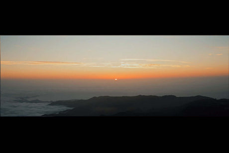 What is the Function of the Lens | Wide & Telephoto Explained - panoramic sunset view over mountains.