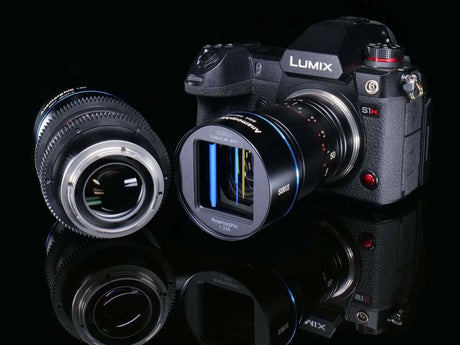 Lumix S1H camera with an anamorphic lens and additional lens, showcasing versatile cinematography equipment.