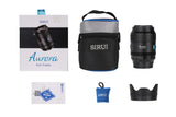 SIRUI AURORA Series 35mm F1.4 Full-frame Autofocus Lens with packaging and accessories displayed.